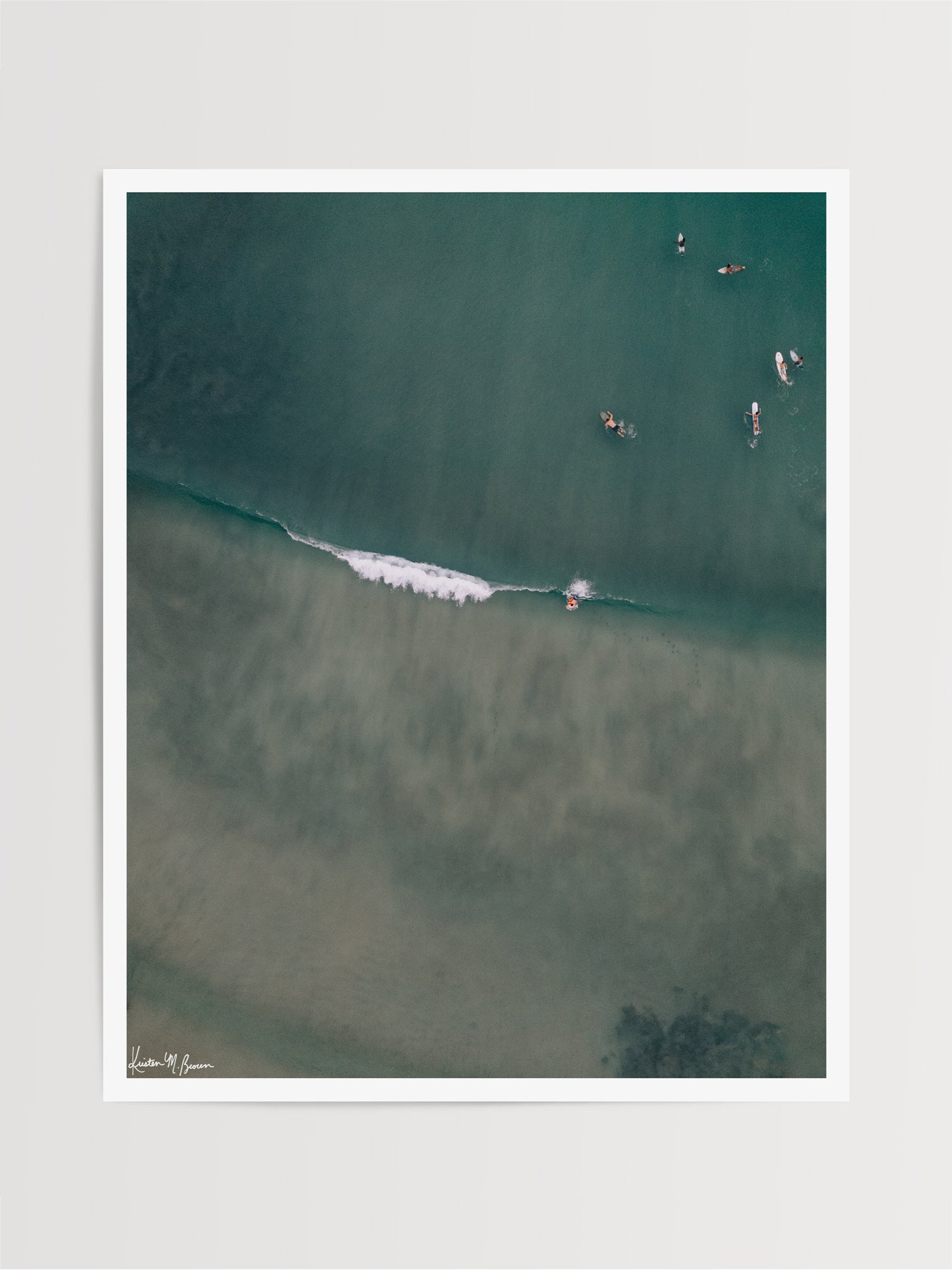 Aerial surfer wave fine art print by Samba to the Sea at The Sunset Shop. Image is an aerial photo of surfer dropping in on a wave in Playa Avellanas, Costa Rica.