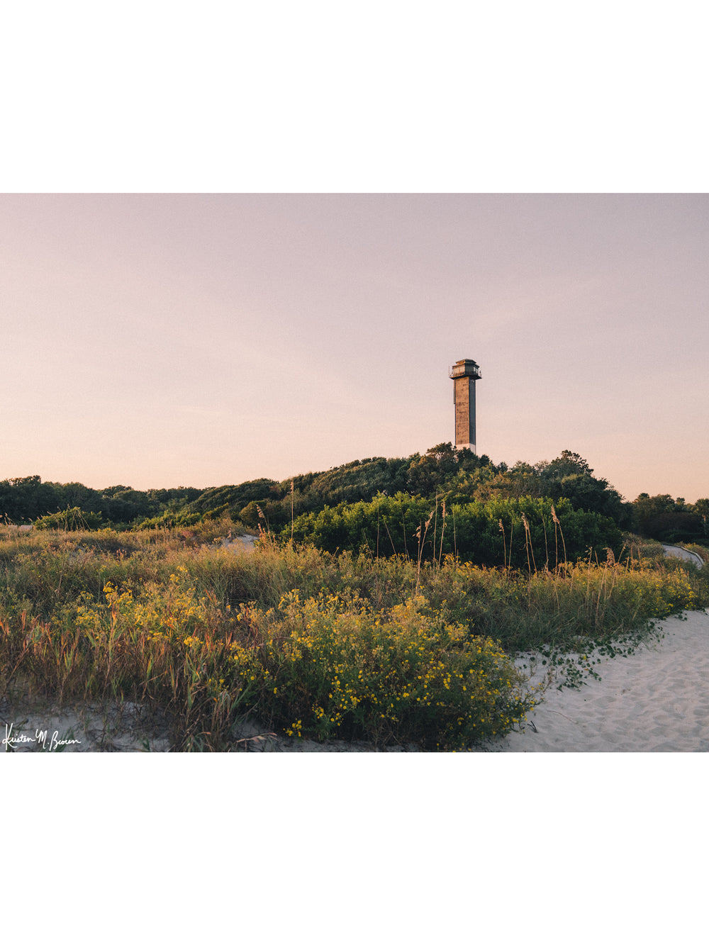 Photograph of Sullivan's Island lighthouse and beach dunes with pastel sunset sky. "Charleston Light" photographed by Kristen M. Brown, Samba to the Sea.