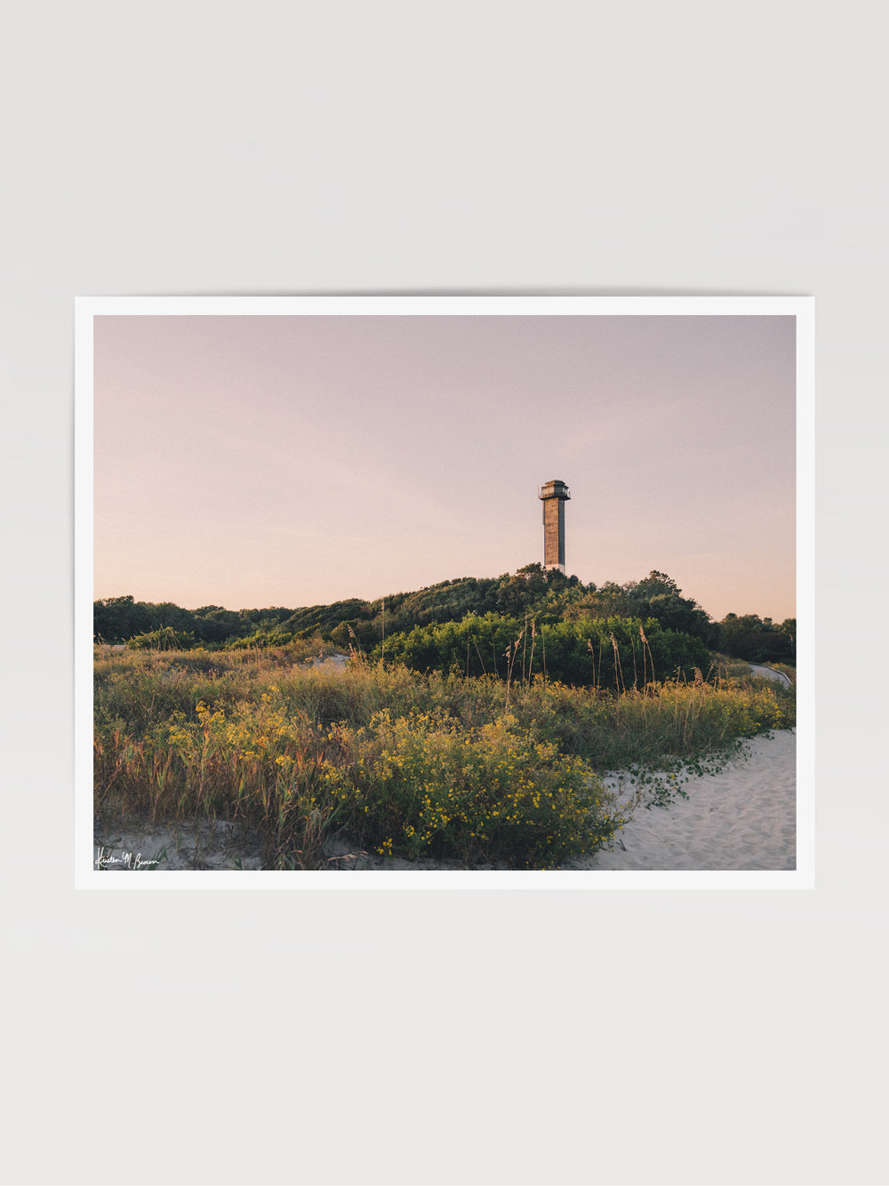 Framed photograph print of Sullivan's Island lighthouse and beach dunes with pastel sunset sky. "Charleston Light" photographed by Kristen M. Brown, Samba to the Sea.