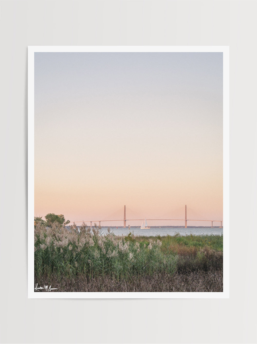 Photography print of sailboat sailing at sunset in Charleston Harbor with Ravenel Bridge. "Harbor Sunset Sail" photographed by Kristen M. Brown, Samba to the Sea.