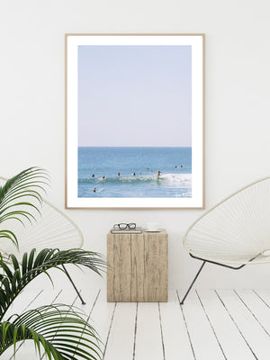 Surfer girl hanging five in Malibu, California. "Malibu Hanging" surfer photo print by Kristen M. Brown of Samba to the Sea for The Sunset Shop. Surfer photography wall art in tropical coastal living room.