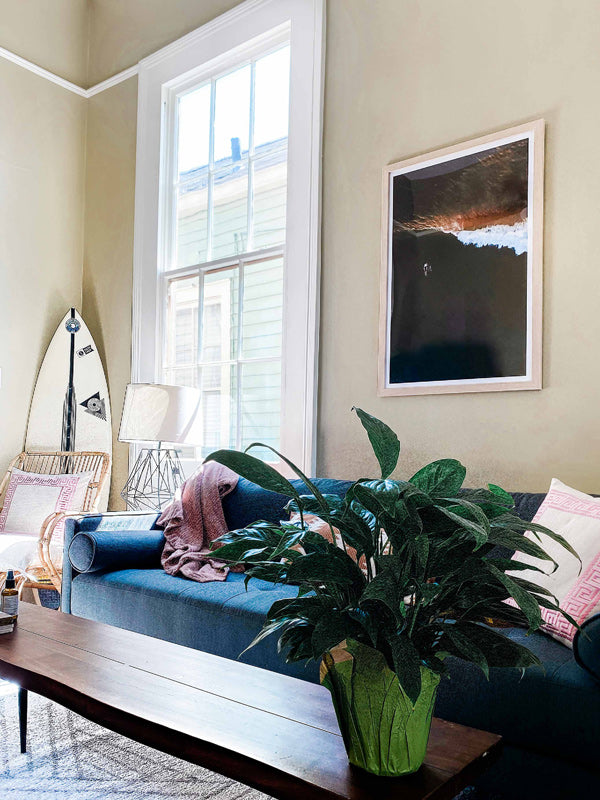Boho surf shack in New Orleans. Framed photo print of surfer paddling out in Costa Rica. Aerial surfer photo by Kristen M. Brown of Samba to the Sea for The Sunset Shop.
