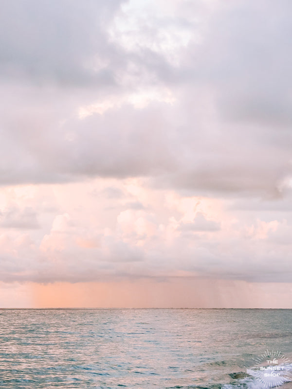Pastel pink rain over Miami Beach during sunrise. Photo by Kristen M. Brown of Samba to the Sea.