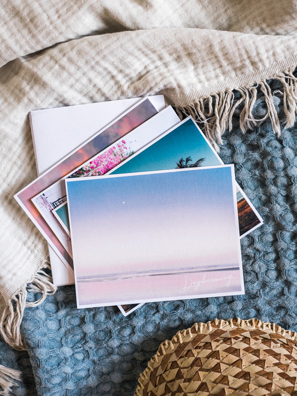 "Daydreaming" notecard. What's better than a text message from a loved one? Happy mail from a loved one! š«š Grab this dreamy set of four notecards printed on divine linen card stock (blank inside) and start sending some love notes to your mom, boyfriend/girlfriend, best friend...and of course your grandma! By Kristen M. Brown, Samba to the Sea for The Sunset Shop.