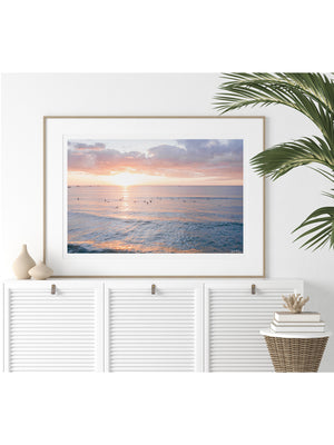 Sunset surf aerial photo print in white coastal tropical living room. Aerial photo of sunset waves “Sunset Board Meeting” in Tamarindo Costa Rica photographed by Kristen M. Brown, Samba to the Sea for The Sunset Shop.