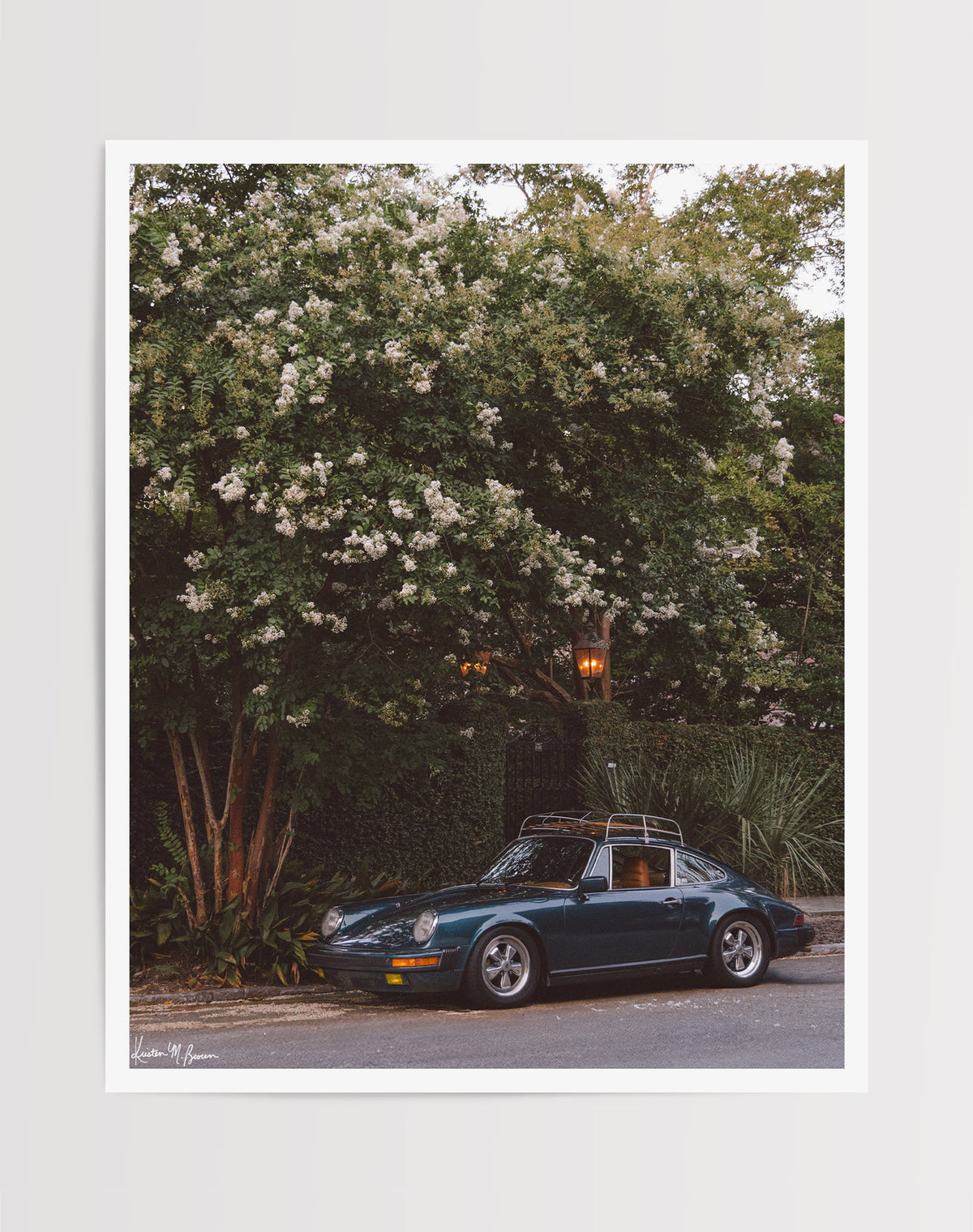Tucked beneath the cascading white blooms of a towering crepe myrtle, this vintage Porsche 911 awaits its next adventure. So what are you waiting for? Hop on in and channel that carefree feeling of adventure and speed with this air cooled vintage beauty, "911 Meeting".  Vintage Porsche 911 photo print by Kristen M. Brown of Samba to the Sea for The Sunset Shop.