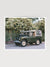 Step on into a whimsical world of adventure with "Africa Awaits"! Featuring a classic green Land Rover Series three playfully adorned with blow up safari animals backdropped by fragrantly blooming Star Jasmine, this fine art photograph celebrates the spirit of exploration and childhood wonder. Photo print by Kristen M. Brown of Samba to the Sea for The Sunset Shop.