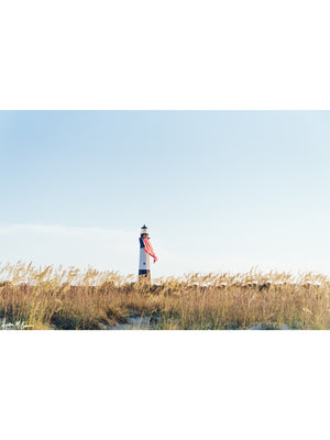 There she was, dancing in the sea breeze with the sea grass and shimmering in the late afternoon sun! Majestic American flag hanging from the Tybee Island Lighthouse in Tybee Island, GA. "Amber Waves" photographed by Kristen M. Brown, Samba to the Sea for The Sunset Shop.