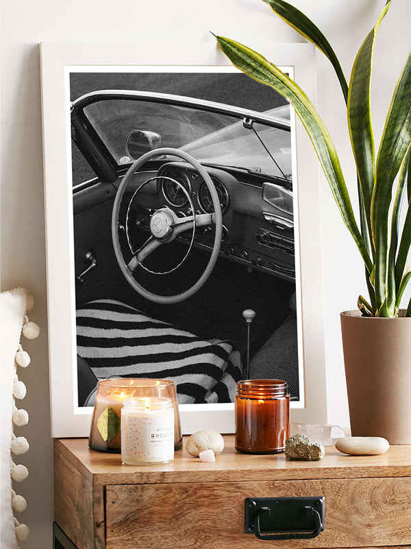 "Beach Benz 190SL" black and white photo print of classic convertible Mercedes Benz 190SL perfectly parked on the Pacific Coast Highway in Laguna Beach, CA. Photographed by Kristen M. Brown of Samba to the Sea for The Sunset Shop. Vintage Mercedes Benz photo print in modern coastal living room.