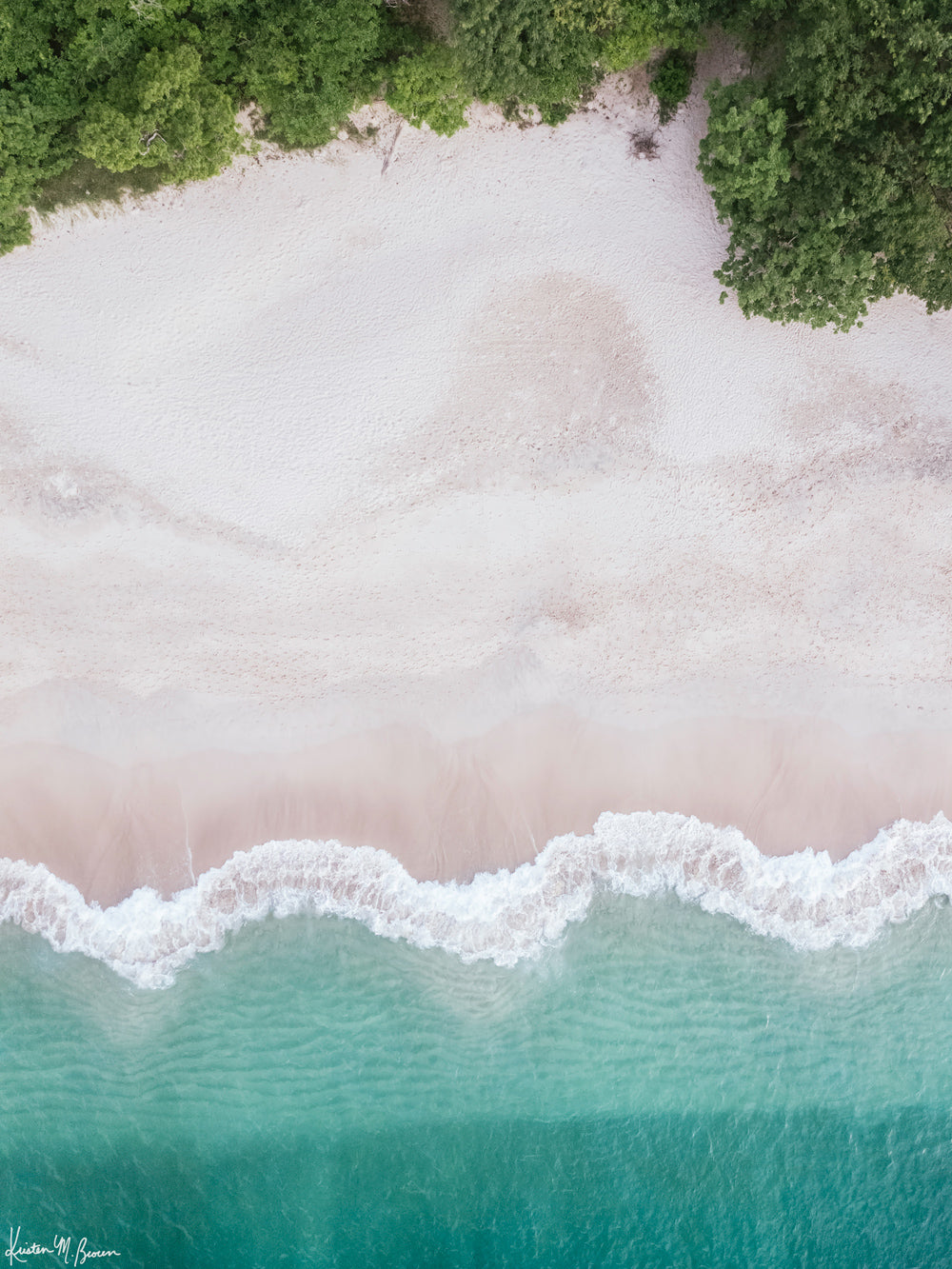 Aerial image of white sand beach and turquoise water of the beach at Playa Conchal, Costa Rica. Aerial beach print by Samba to the Sea at The Sunset Shop.