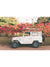 "Blooming and Cruising" photo print of vintage Toyota FJ40 Land Cruiser racked up with surfboards among vibrantly blooming Bougainvillea flowers in Costa Rica. Photographed by Costa Rica photographer Kristen M. Brown of Samba to the Sea for The Sunset Shop.