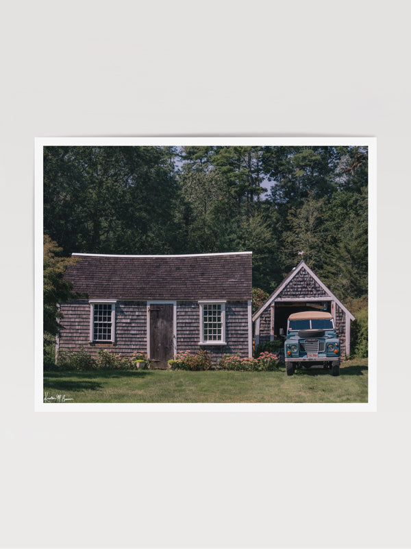 &quot;Blue River Rover&quot; photo print of classic Land Rover series three perfectly parked in front of a coastal New England cedar shake cottage. Photographed by Kristen M. Brown of Samba to the Sea for The Sunset Shop.