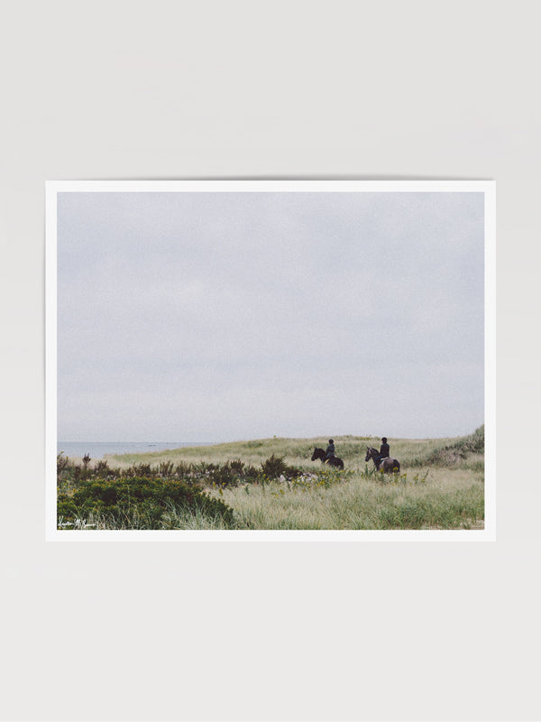 "Dune Ride" photo print of equestrians riding their horses through the beach dunes in coastal New England. Photographed by Kristen M. Brown of Samba to the Sea for The Sunset Shop.