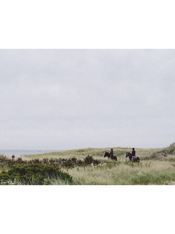 &quot;Dune Ride&quot; photo print of equestrians riding their horses through the beach dunes in coastal New England. Photographed by Kristen M. Brown of Samba to the Sea for The Sunset Shop.