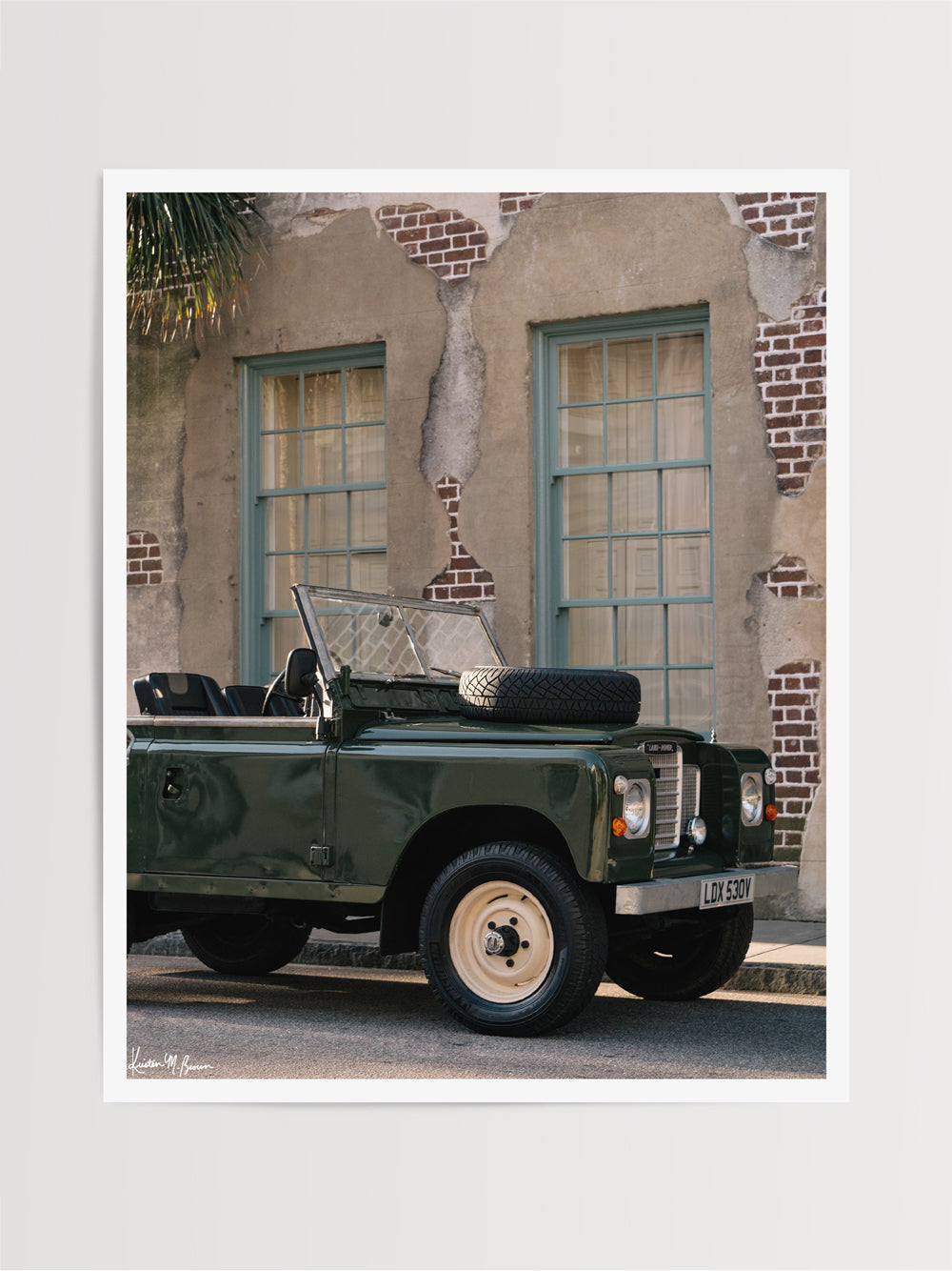 From the moment you step foot in Charleston, you're instantly transported back to another time and place. And if you're going to transport back, why not go in style with this classic Land Rover Series three truck? Hop on in, the top is off and this Rover is waiting for you! Photo print by Kristen M. Brown of Samba to the Sea for The Sunset Shop.