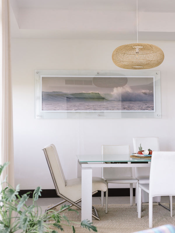 Beautiful breaking wave photo print hanging in a modern boho home in Costa Rica. Find Me Where the Waves Are wave print photographed by Kristen M. Brown of Samba to the Sea for The Sunset Shop.