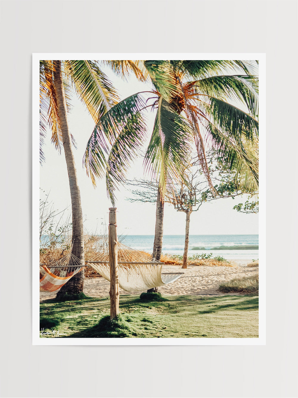 Ocean view hammock under palm trees in Costa Rica. Beach print at The Sunset Shop by Samba to the Sea.