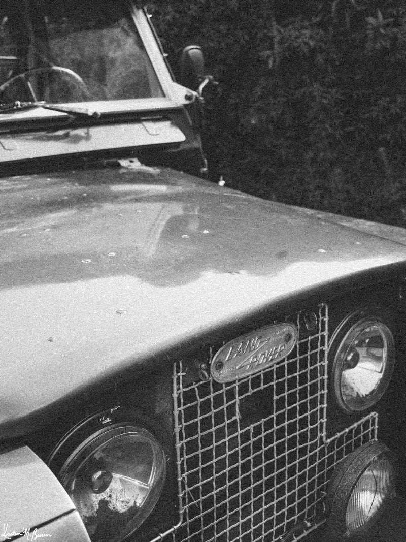 Tucked away in between volcanoes, there lies a magical cloud forest called Monteverde in Costa Rica with a vintage Land Rover Series Two awaiting your arrival. Welcome back to your adventure daydream, all from the comfort of your home...wherever home may be with "Landy Two". Black and white photo print of Land Rover Series 2 by Kristen M. Brown of Samba to the Sea for The Sunset Shop.