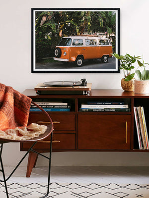 Midcentury modern coastal living room. Orange VW Bus photo print in Southern California. “Leucadia Bus” photo print of a beautiful vintage VW Bus in Encinitas, California by Kristen M. Brown of Samba to the Sea for The Sunset Shop. 