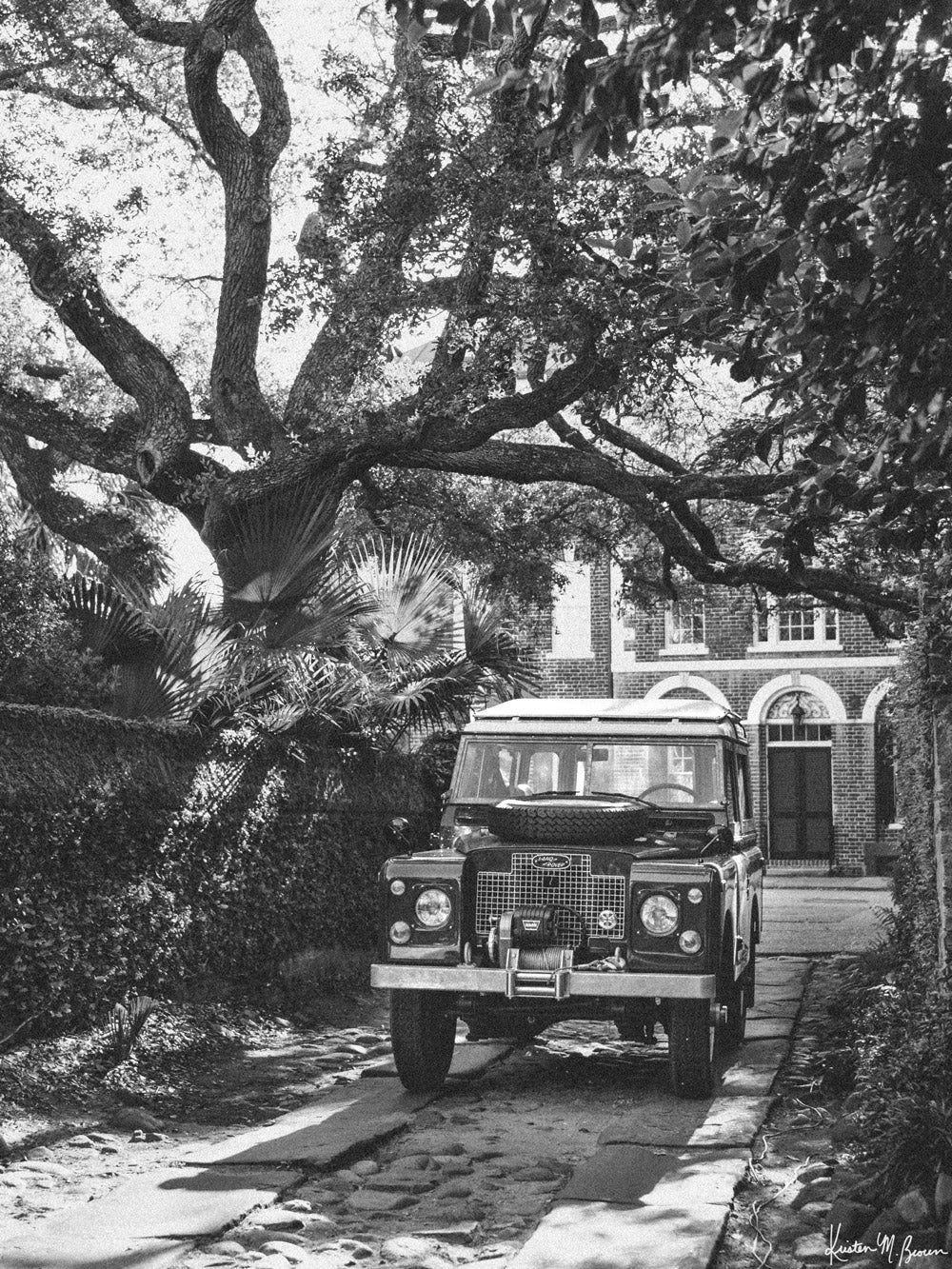 Hop on into &quot;Longitude Rover&quot; and take a journey down the timeless, charming streets of Charleston in this classic Land Rover Series III. Photo print by Kristen M. Brown of Samba to the Sea for The Sunset Shop.