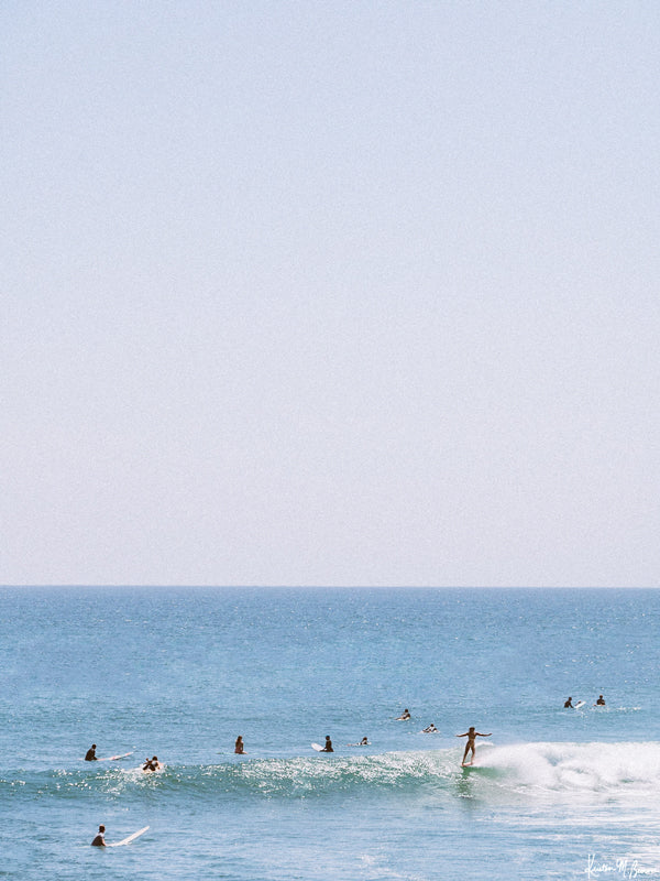 Surfer girl hanging five in Malibu, California. &quot;Malibu Hanging&quot; surfer photo print by Kristen M. Brown of Samba to the Sea for The Sunset Shop. 