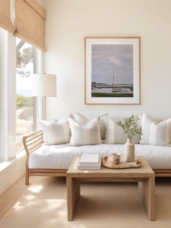 "Path to Powder Point" photo print of wood sailboat moored in Coastal Massachusetts framed print hanging in serene coastal living room. Photographed by Kristen M. Brown of Samba to the Sea for The Sunset Shop.