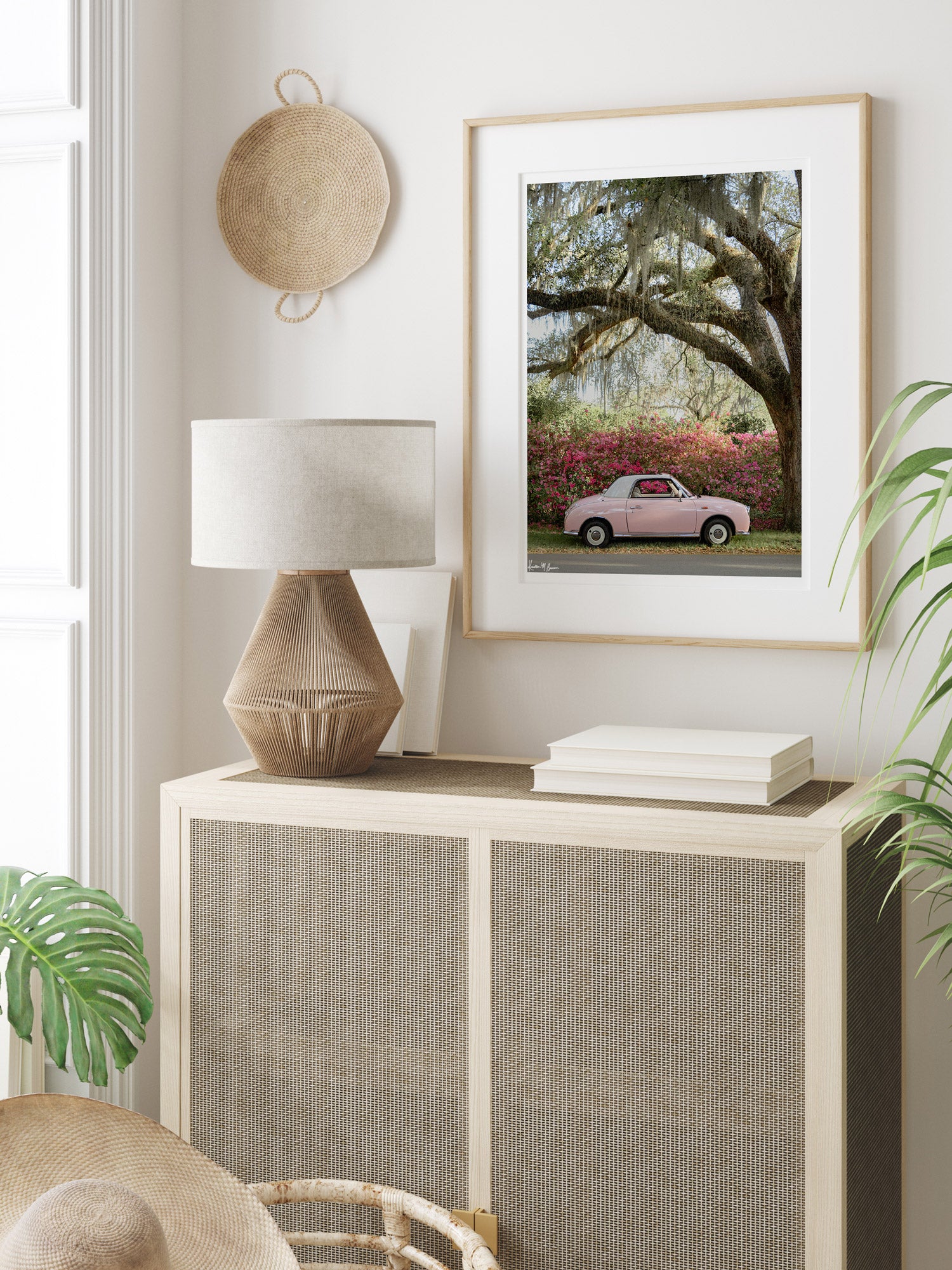 Photography of a pastel pink Figaro perfectly parked with blooming pink and magenta azaleas under an Oak tree in Charleston. “Pretty In Pink Blooming” photographed by Kristen M. Brown, Samba to the Sea.