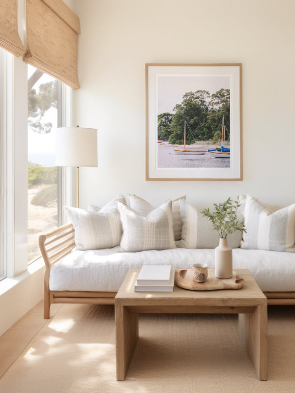 "Ready to Herreshoff" photo print of Herreshoff 12s in Quissett Harbor framed print hanging in serene coastal living room. Photographed by Kristen M. Brown of Samba to the Sea for The Sunset Shop.