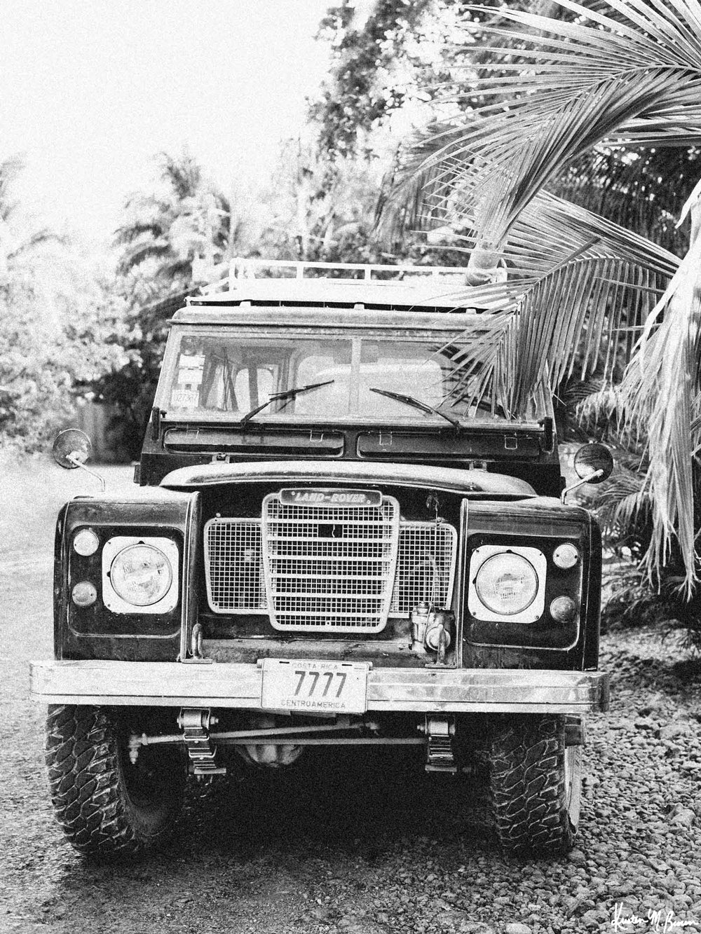 Because life is all about the magic in the detours and the beauty of taking time to explore bumpy, back road dirt roads in tropical paradise with a vintage Land Rover just like this. Black &amp; White Vintage Land Rover Series 3 in Nosara, Costa Rica. Photographed by Kristen M. Brown, Samba to the Sea for The Sunset Shop.