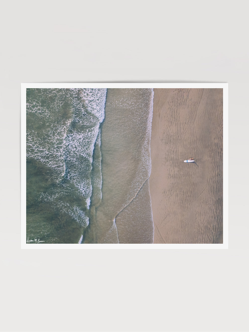 Aerial image of surfer on the beach in Nosara Costa Rica. Salt & Water aerial beach print photographed by Samba to the Sea for The Sunset Shop.