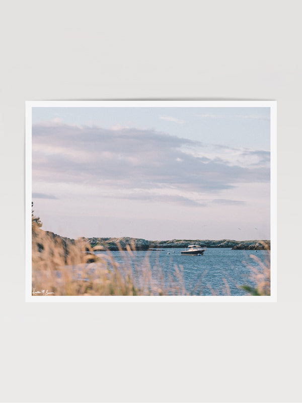 "Seaclusion" photo print of wood motorboat moored along Ocean Drive in Newport, RI. Photographed by Kristen M. Brown of Samba to the Sea for The Sunset Shop.