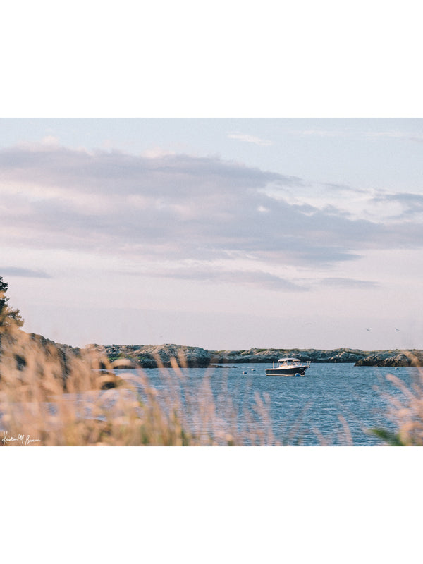 &quot;Seaclusion&quot; photo print of wood motorboat moored along Ocean Drive in Newport, RI. Photographed by Kristen M. Brown of Samba to the Sea for The Sunset Shop.