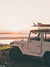 "Seek and You Will Find" photo print of vintage Toyota FJ40 Land Cruiser racked up with surfboards parked at the beach in Costa Rica as the waves peel and the sun kissing the horizon turns everything golden. Photographed by Costa Rica photographer Kristen M. Brown of Samba to the Sea for The Sunset Shop.