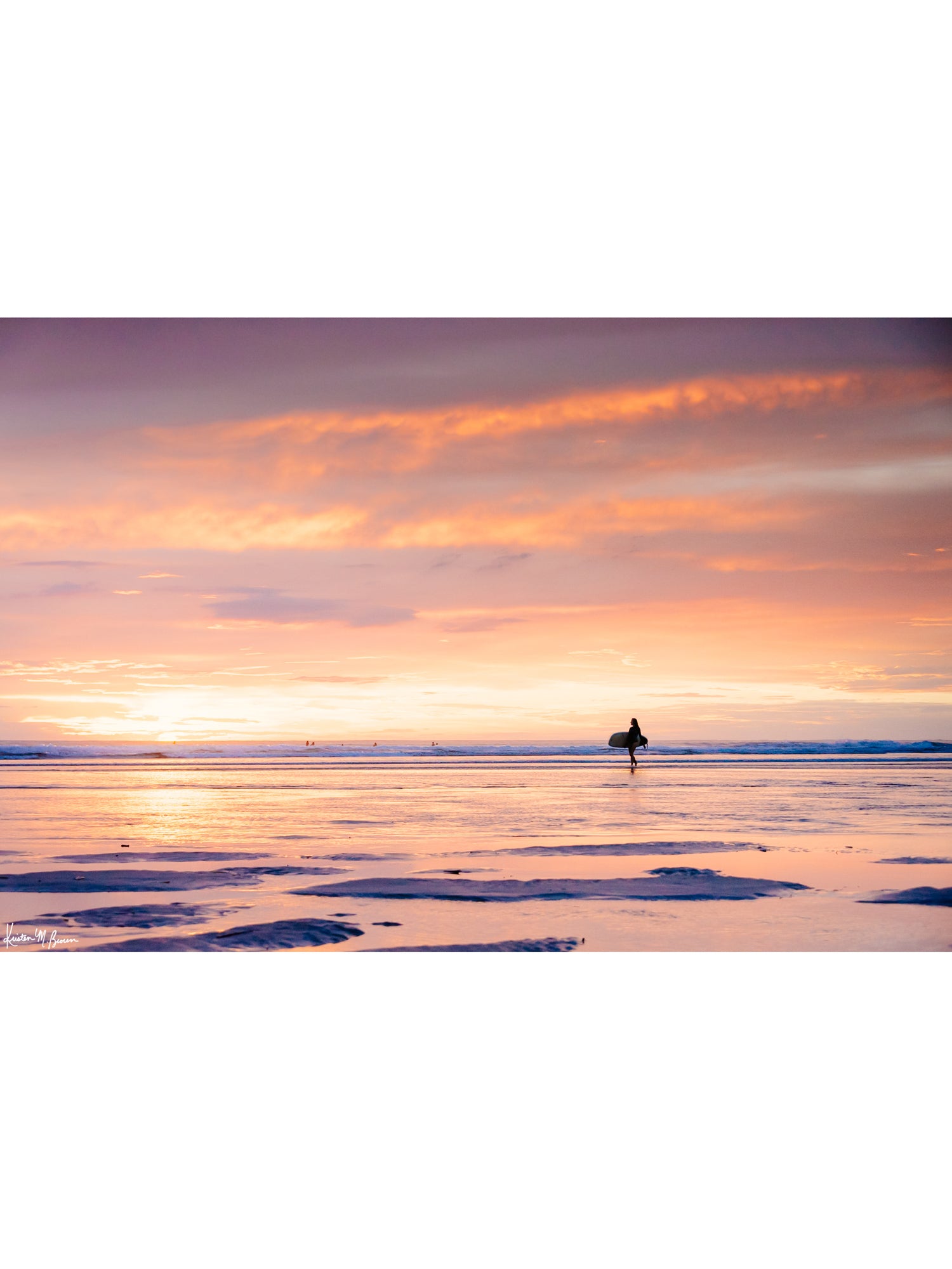 She's Magic sunset surfer print by Samba to the Sea at The Sunset Shop. Photo of a female surfer walking on the beach during a pastel pink sunset in Tamarindo, Costa Rica.