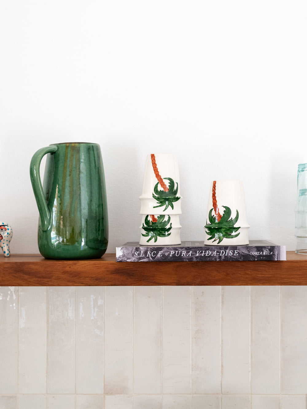 Costa Rica coffee table book. Dream away in this breathtaking photographic journey through Costa Rica's captivating coastline with this fine art Costa Rica coffee table book, Slice of Pura Vida-dise. Experience a part of the laid back “pura vida” way of life Costa Rica is infamous for with over 150 awe-inspiring images of pristine beaches, jaw dropping sunsets, and the alluring surf lifestyle. Photographed by Kristen M. Brown of Samba to the Sea.