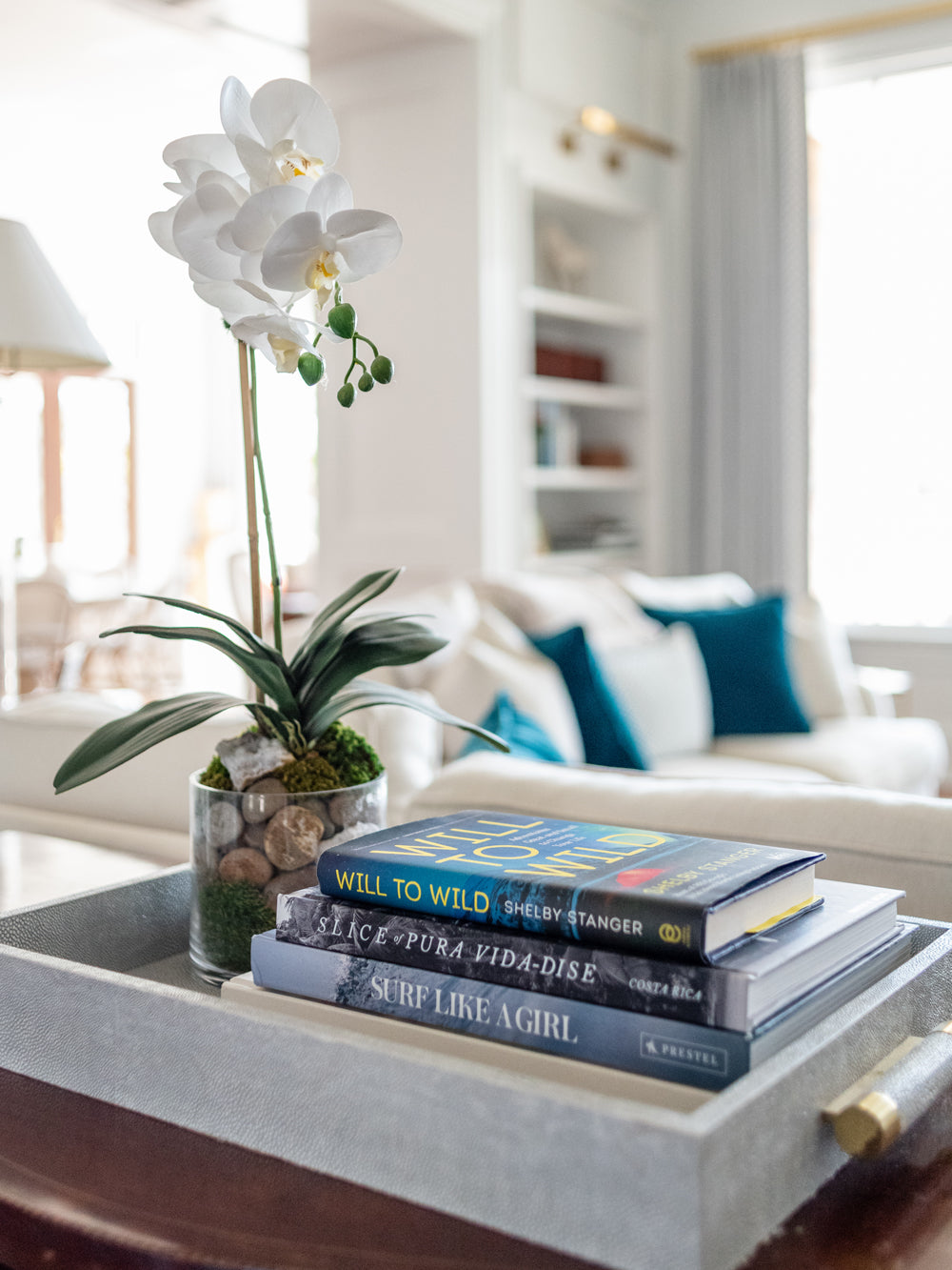 Costa Rica coffee table book. Dream away in this breathtaking photographic journey through Costa Rica's captivating coastline with this fine art Costa Rica coffee table book, Slice of Pura Vida-dise. Experience a part of the laid back “pura vida” way of life Costa Rica is infamous for with over 150 awe-inspiring images of pristine beaches, jaw dropping sunsets, and the alluring surf lifestyle. Photographed by Kristen M. Brown of Samba to the Sea.