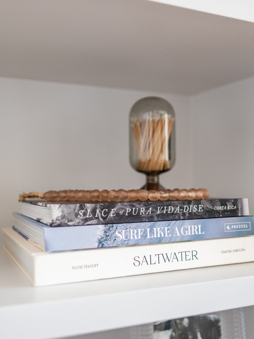 Costa Rica coffee table book. Dream away in this breathtaking photographic journey through Costa Rica's captivating coastline with this fine art Costa Rica coffee table book, Slice of Pura Vida-dise. Experience a part of the laid back “pura vida” way of life Costa Rica is infamous for with over 150 awe-inspiring images of pristine beaches, jaw dropping sunsets, and the alluring surf lifestyle. Photographed by Kristen M. Brown of Samba to the Sea.