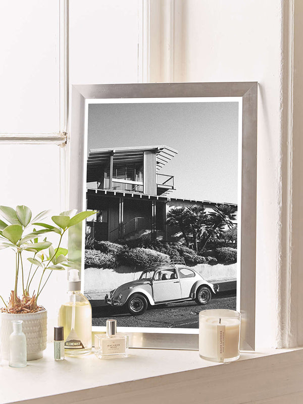 "Stonesteps Bug" black and white photo print of classic VW Bug 1300 perfectly parked at Stonesteps in Encinitas, CA. Photographed by Kristen M. Brown of Samba to the Sea for The Sunset Shop.