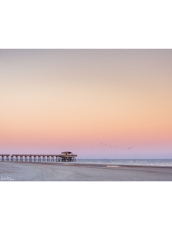 Beautiful pastel pink sunset of Tybee Island Pier in Tybee Island, Georgia. Photographed by Samba to the Sea for The Sunset Shop.