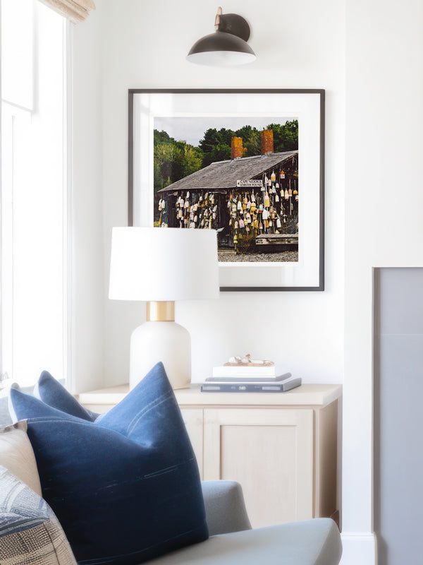 "The Lobstah Pound" photo print of Cape Neddick Lobster Pound in Maine framed print hanging in serene living room. Photographed by Kristen M. Brown of Samba to the Sea for The Sunset Shop.