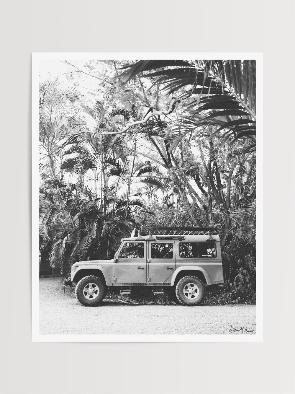 Because life is all about the magic in the detours and the beauty of taking time to explore bumpy, back road dirt roads in tropical paradise with Land Rover Defender just like this. "Tropical Sleigh" black and white Land Rover photo print photographed by Kristen M. Brown, Samba to the Sea for The Sunset Shop.