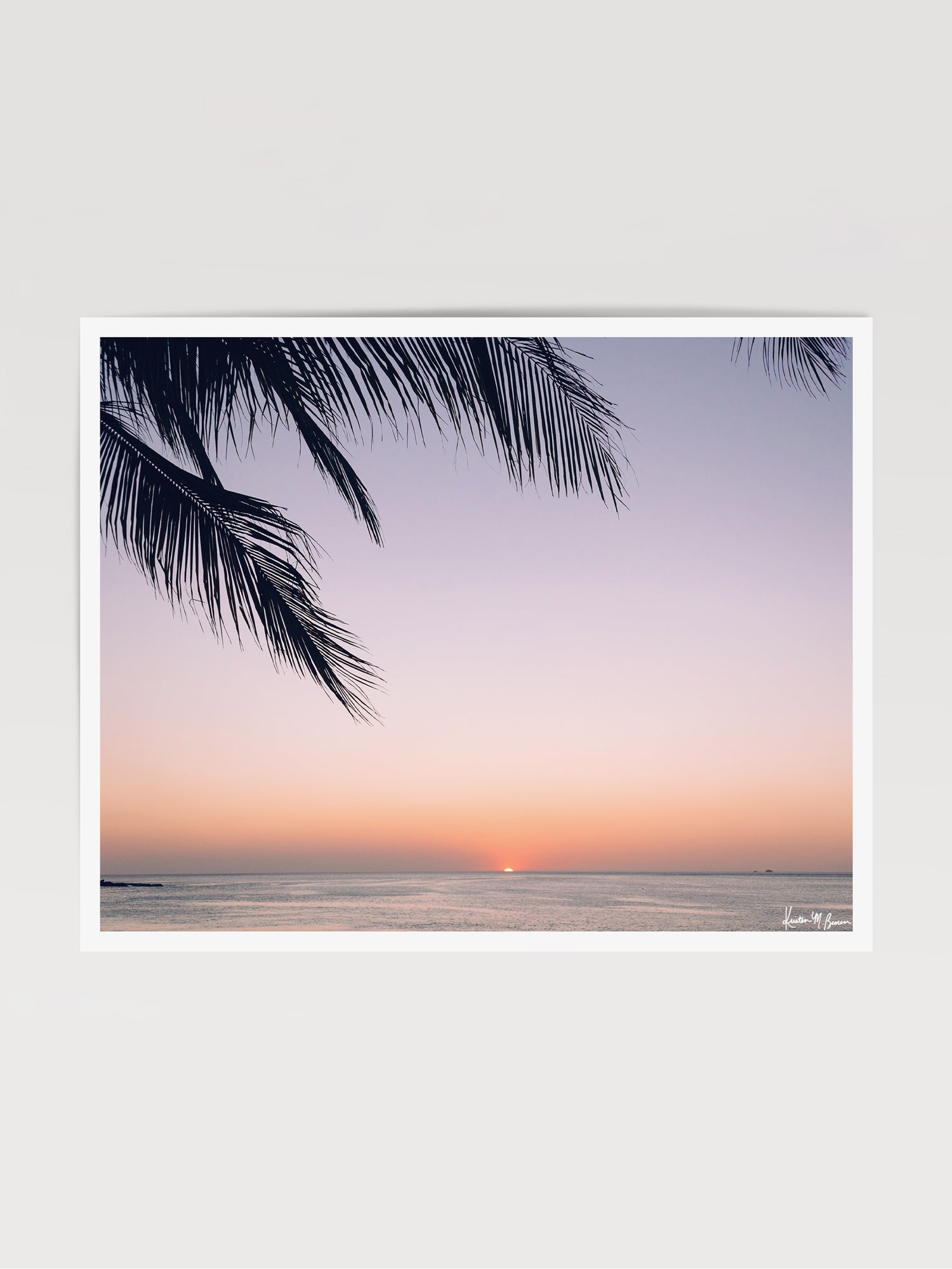 Beautiful palm tree silhouette with an ombre sunset sky over the ocean in Costa Rica. Photographed by Samba to the Sea for The Sunset Shop.