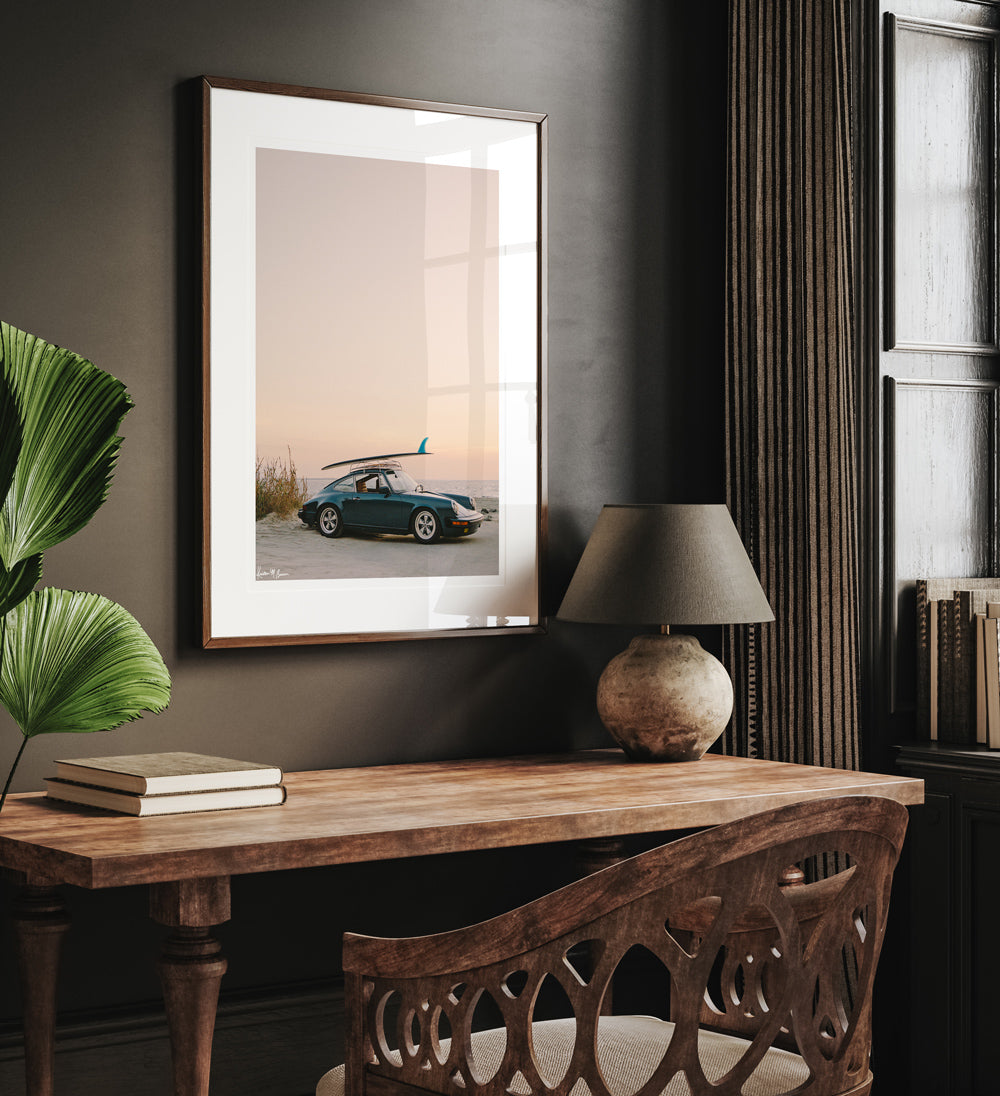 Photograph of vintage Porsche 911 parked at the beach with a classic single fin surfboard amidst a pastel pink sunset sky. "Single Fin Sunset Ride" photographed by Kristen M. Brown, Samba to the Sea.