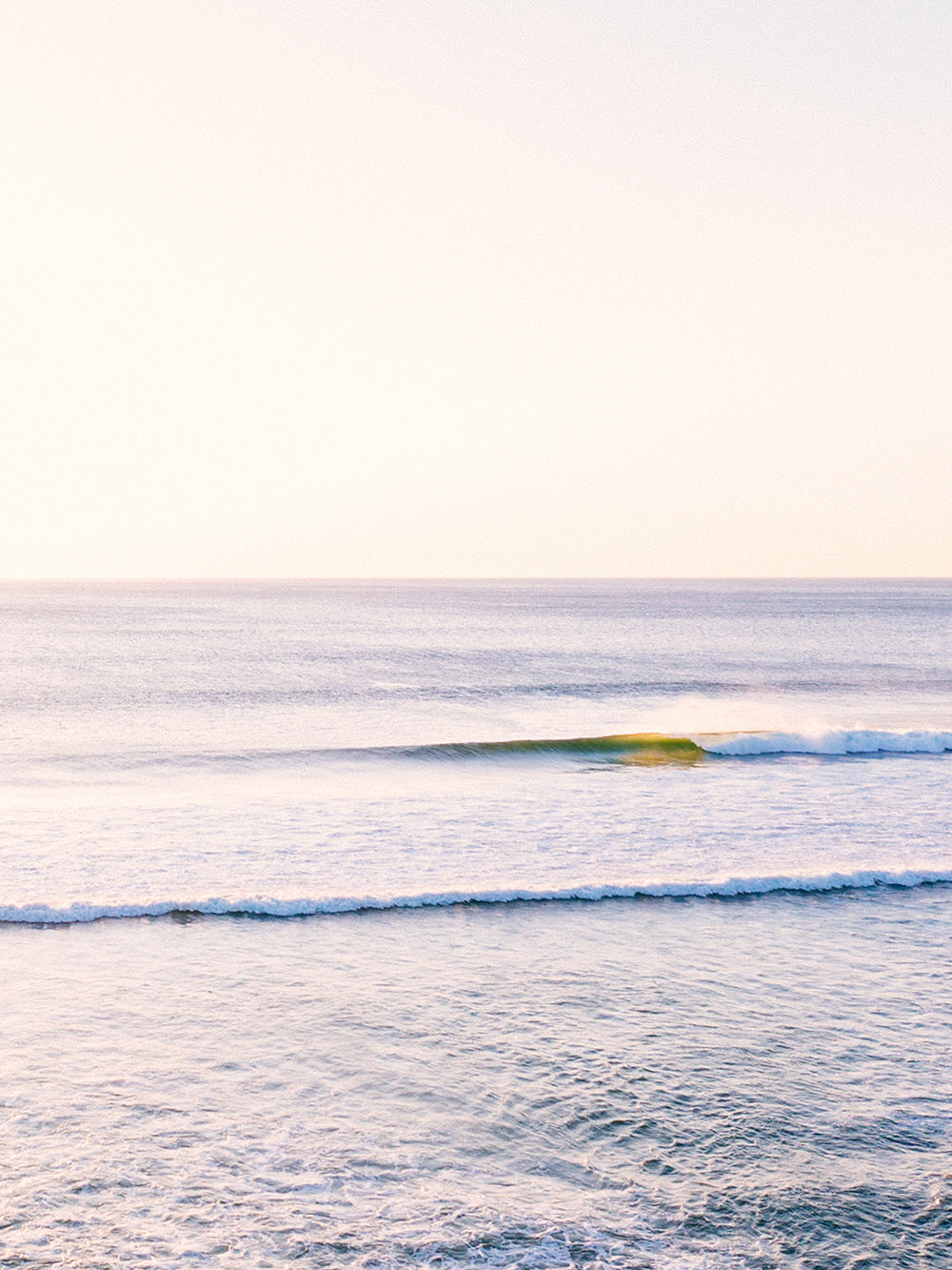 Golden turquoise wave breaking during golden hour in Costa Rica. "Wave Watch" aerial wave photo by Kristen M. Brown, Samba to the Sea for The Sunset Shop.