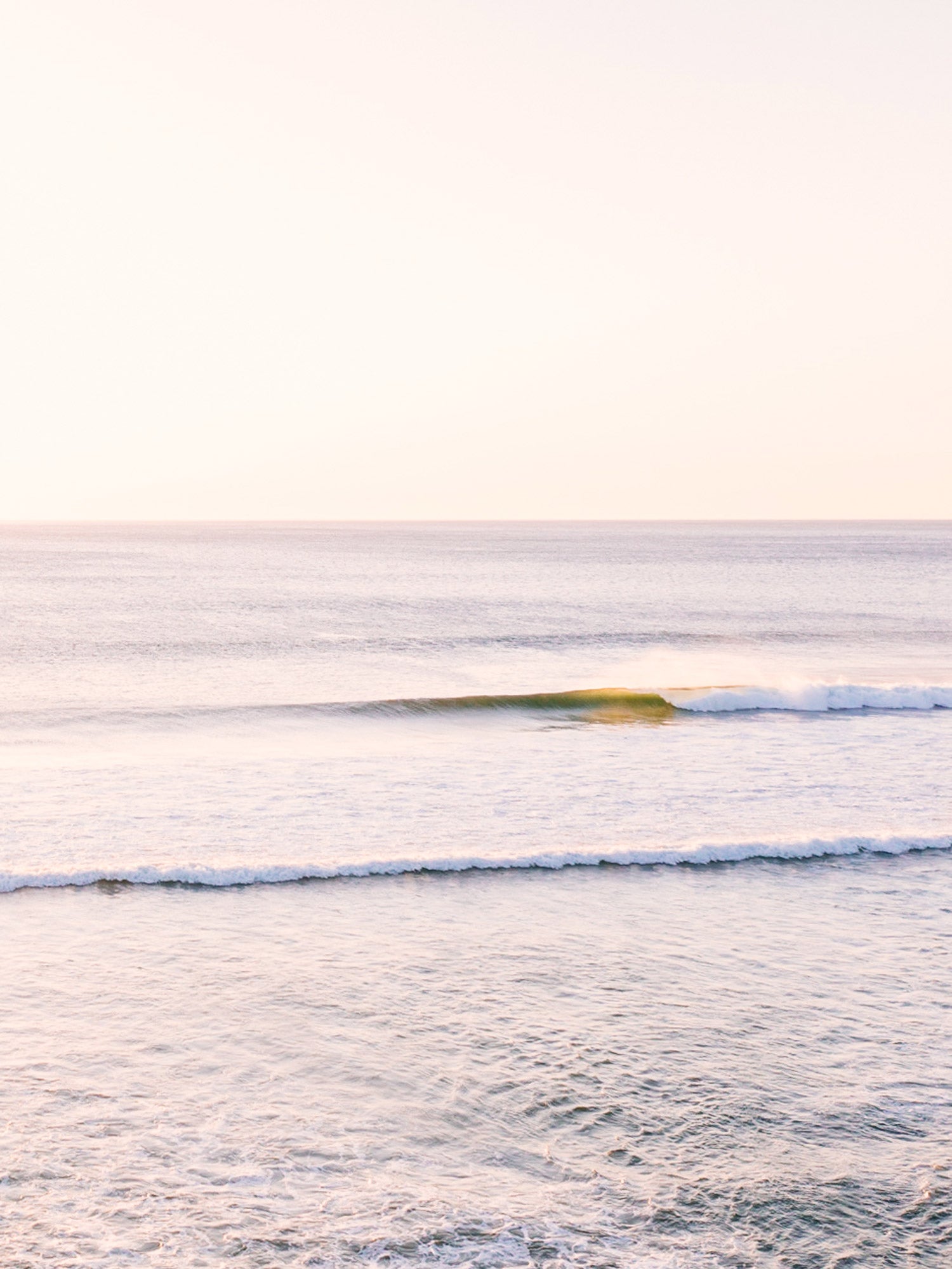 Golden turquoise wave breaking during golden hour in Costa Rica. "Wave Watch" aerial wave photo by Kristen M. Brown, Samba to the Sea for The Sunset Shop.