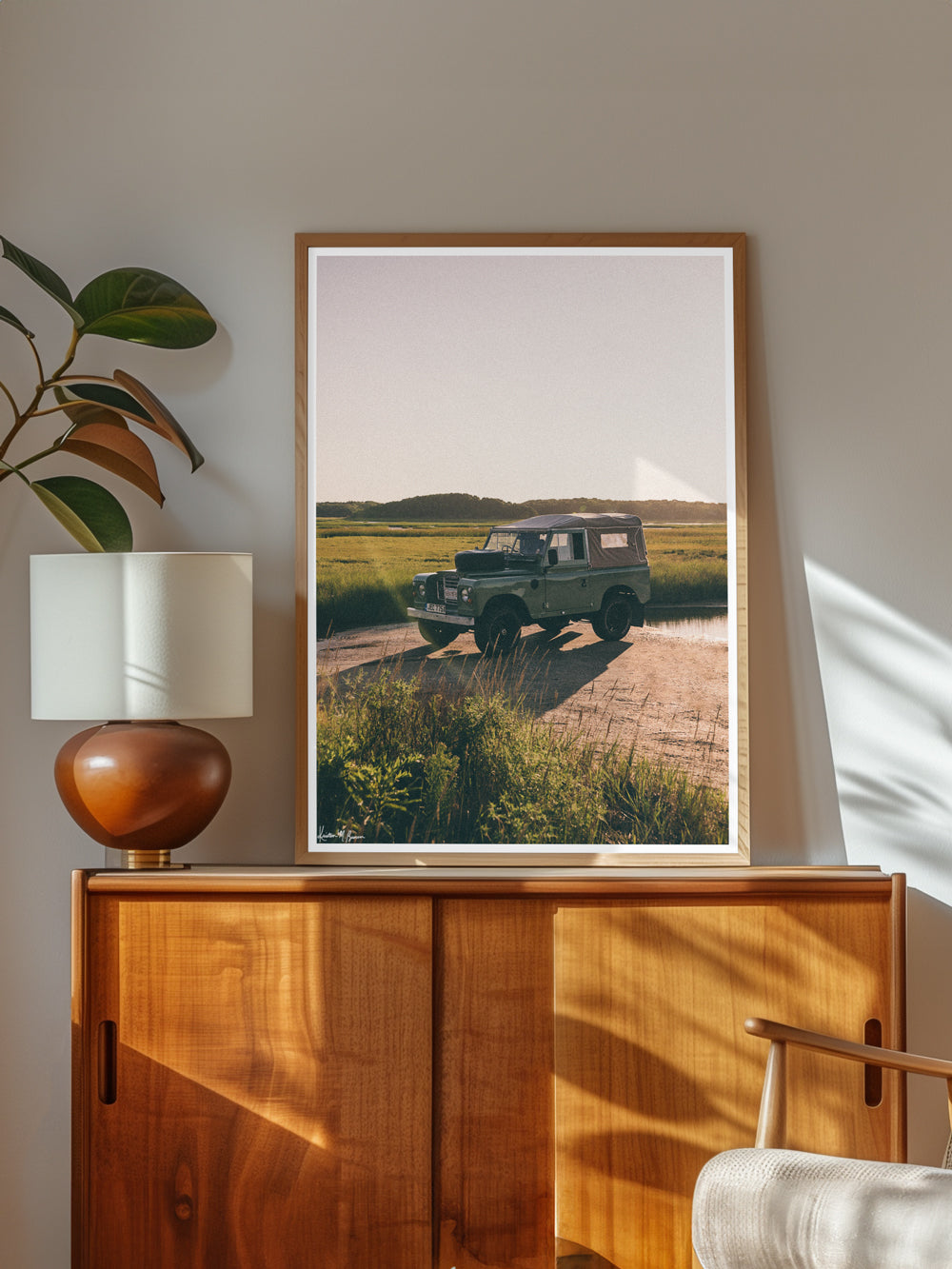 Class Land Rover series photography wall art. There's nothing like knowing that a day of adventure with your Rover is on tap to get you out of bed in the morning! Especially when that adventure has you exploring Cape Cod's beautiful beaches on a pristine blue sky day. So what are you waiting for? Hop on into this Series III that's glowing in the early morning light and get going! Photo print by Kristen M. Brown of Samba to the Sea for The Sunset Shop.