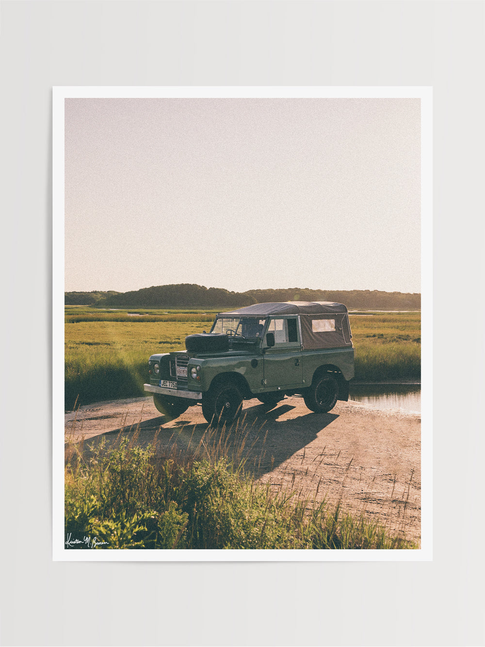 There's nothing like knowing that a day of adventure with your Rover is on tap to get you out of bed in the morning! Especially when that adventure has you exploring Cape Cod's beautiful beaches on a pristine blue sky day. So what are you waiting for? Hop on into this Series III that's glowing in the early morning light and get going! Photo print by Kristen M. Brown of Samba to the Sea for The Sunset Shop.