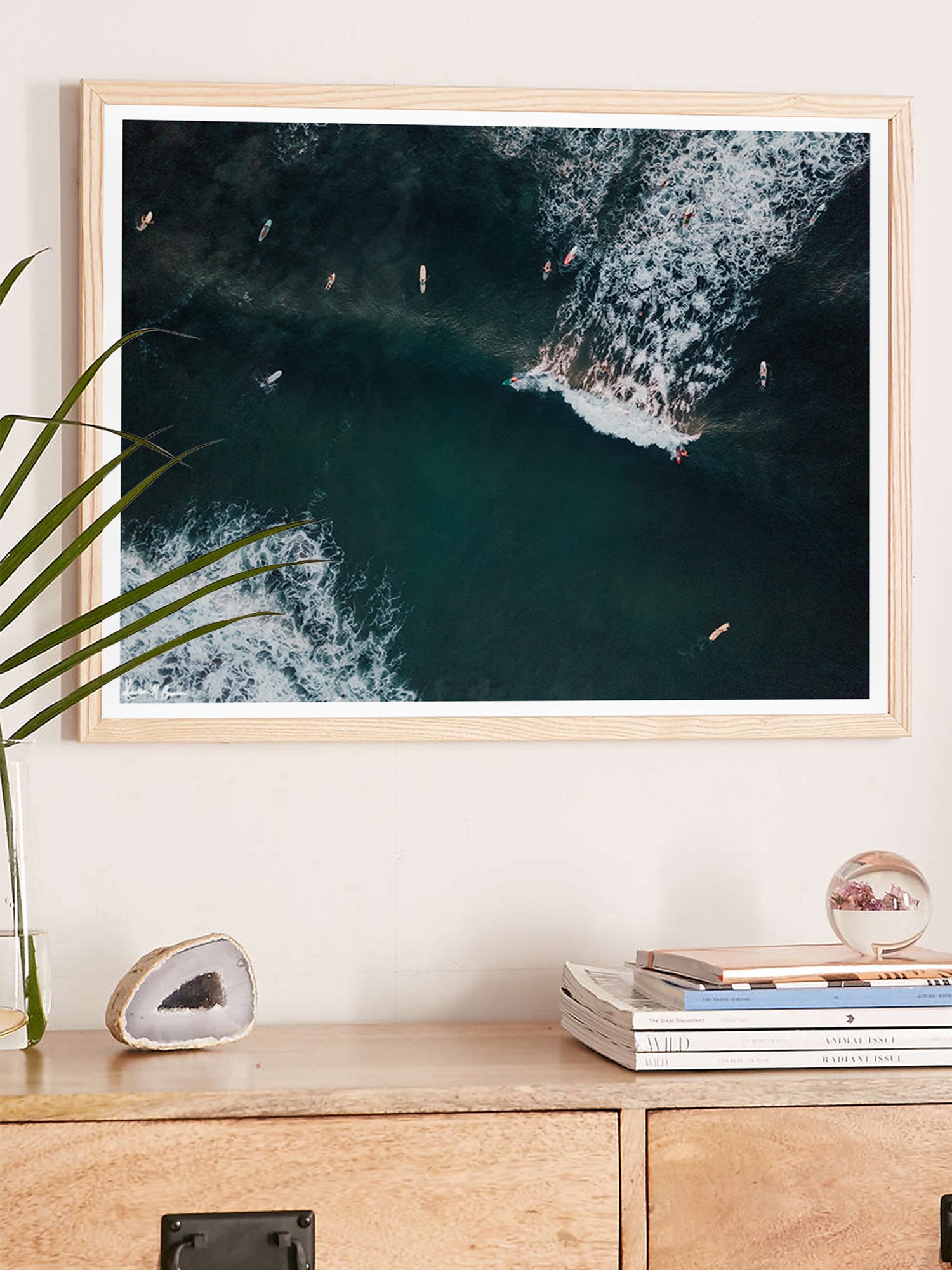 You Go Left and I'll Go Right aerial surfer print by Samba to the Sea at The Sunset Shop. Image is an aerial photo of surfer's splitting the peak in Tamarindo, Costa Rica.