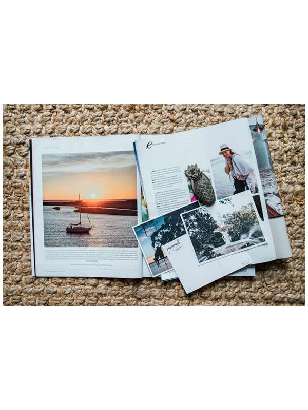 Photographer Kristen M. Brown's sunset sailboat photograph over Delegal Marina  featured in Savannah Magazine. There's nothing quite like being the captain of your own vessel, harnessing the power of the wind, gliding across the water, and going whichever course your heart desires. Especially after a glorious day sailing and coming in to dock during sunset over the marsh! Sunset over the marsh in Savannah, Georgia photographed by Kristen M. Brown of Samba to the Sea for The Sunset Shop.