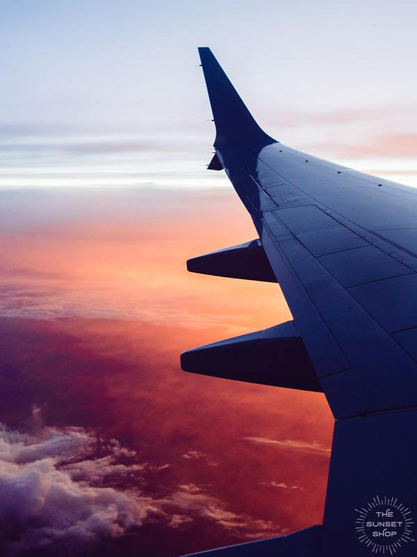 Because life was meant for good friends and adventures. Be inspired to go on your next adventure with this magical pink sunset from an airplane print &quot;And So The Adventure Begins&quot;. Photographed by Kristen M. Brown, Samba to the Sea.